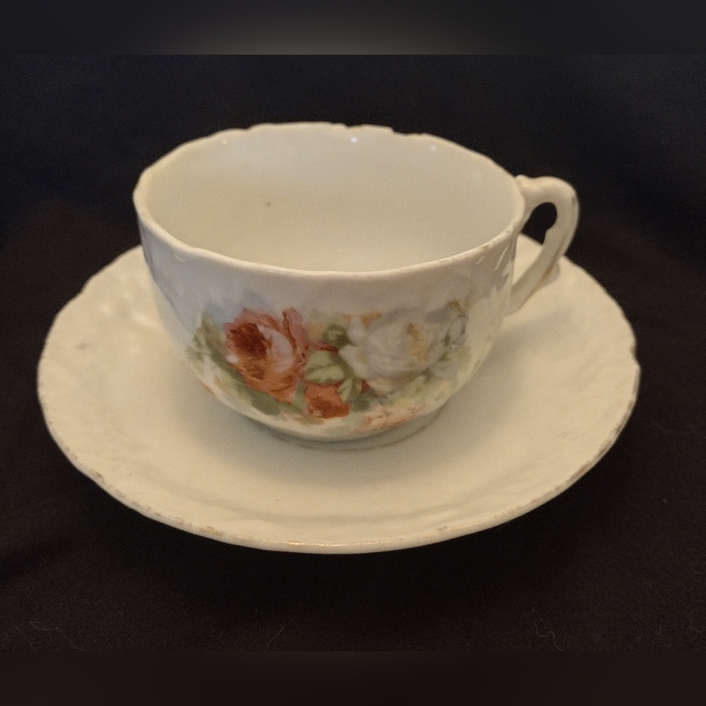 Vintage Unmarked Porcelain Floral Tea Cup and Saucer